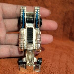 Silver and Black Toy Car with Blue Accents